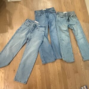 Abercrombie set of Three Light Blue Jeans

2 boot cut
1 relaxed fit
Like new